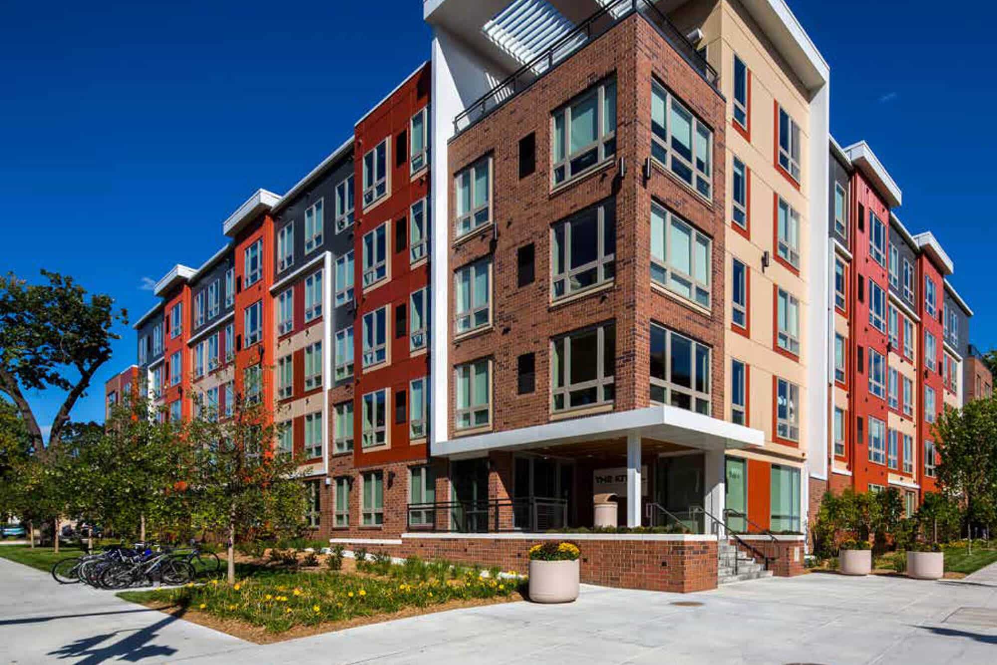 the knoll dinkytown off campus apartments near the university of minnesota building exterior main entrance sidewalk bike rack